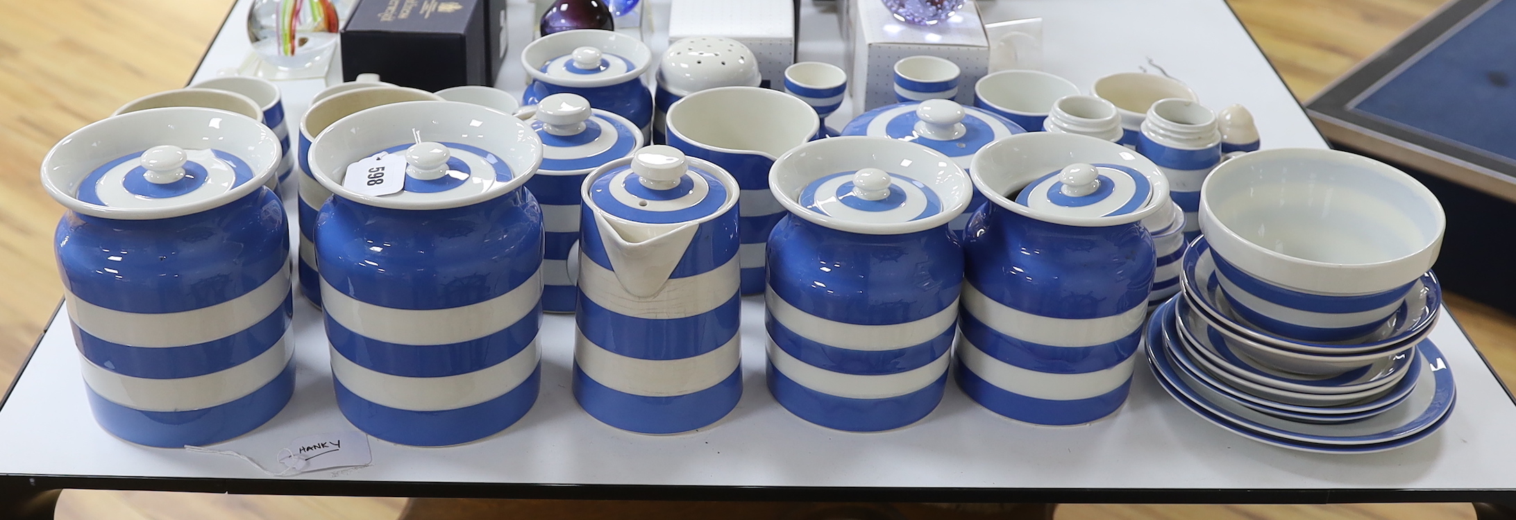 A group of Cornishware comprising mugs, jugs, lidded pots, flour shaker, bowls, salt pot, sugar pot, egg cups, etc. (37)